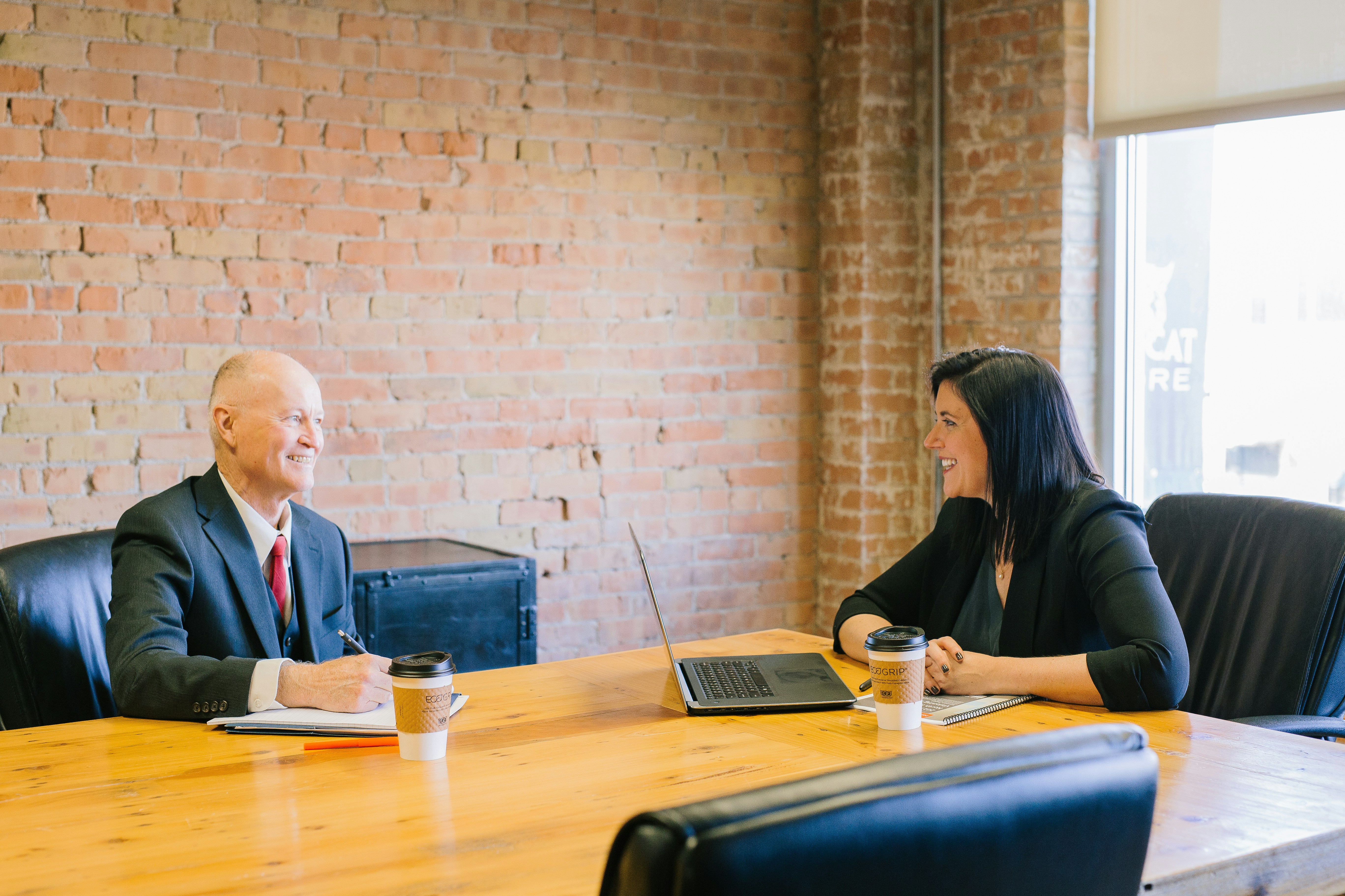 Professional business meeting discussing AI strategy